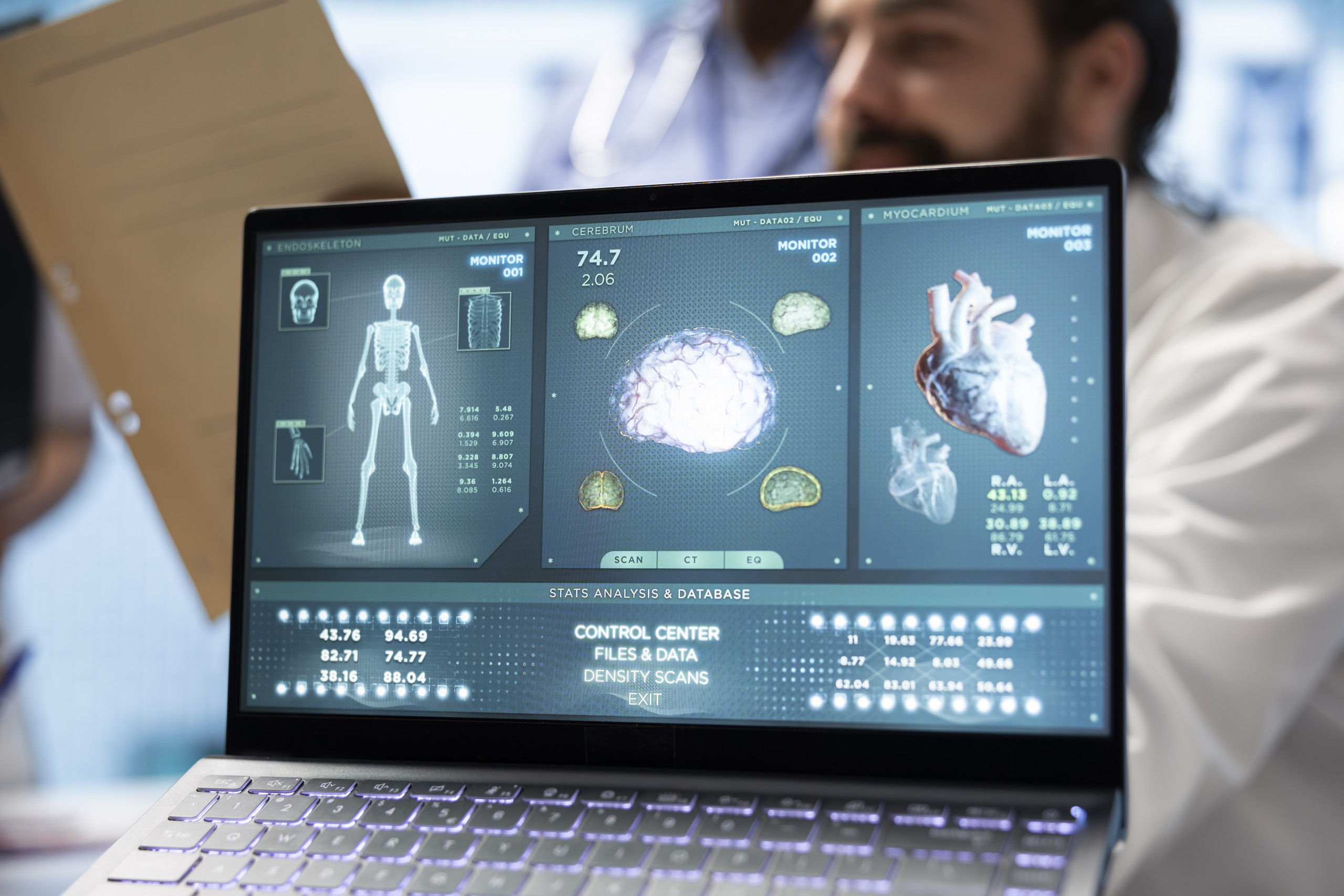 hospital-staff-examine-cardiovascular-x-ray-results-discuss-treatment-option hospital-staff-examine-cardiovascular-x-ray-results-discuss-treatment-option