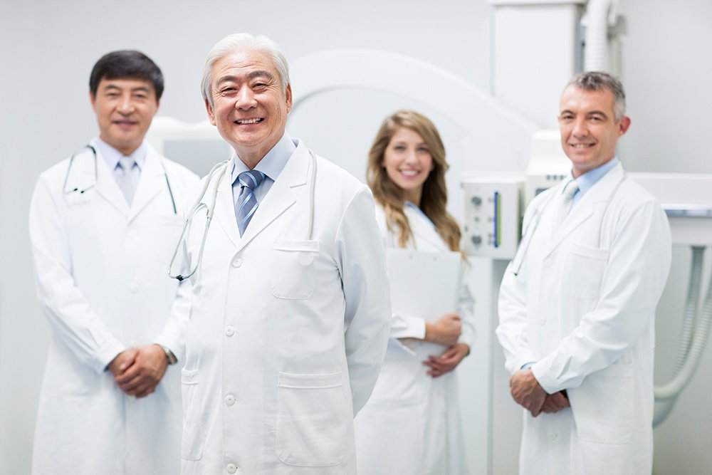 doctors-with-mri-scanner-2024-10-18-07-39-14-utc